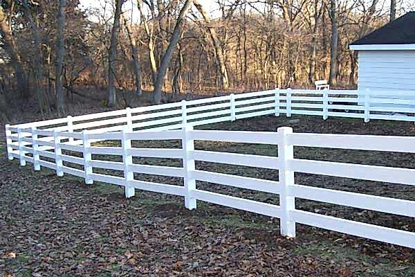 White fence at the backyard.