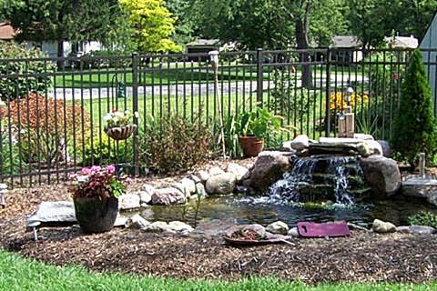 A Ornamental bronze enclosed spear fencing.