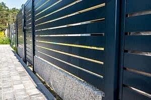 Black metal fence gate for security installed for a house in Batavia, IL
