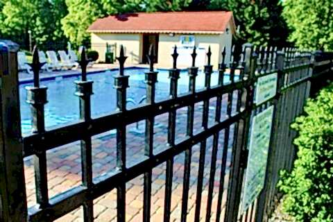 Metal fence installed for a swimming pool area in Batavia, IL