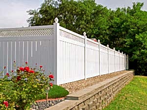 New White colored fence at the Backyard.